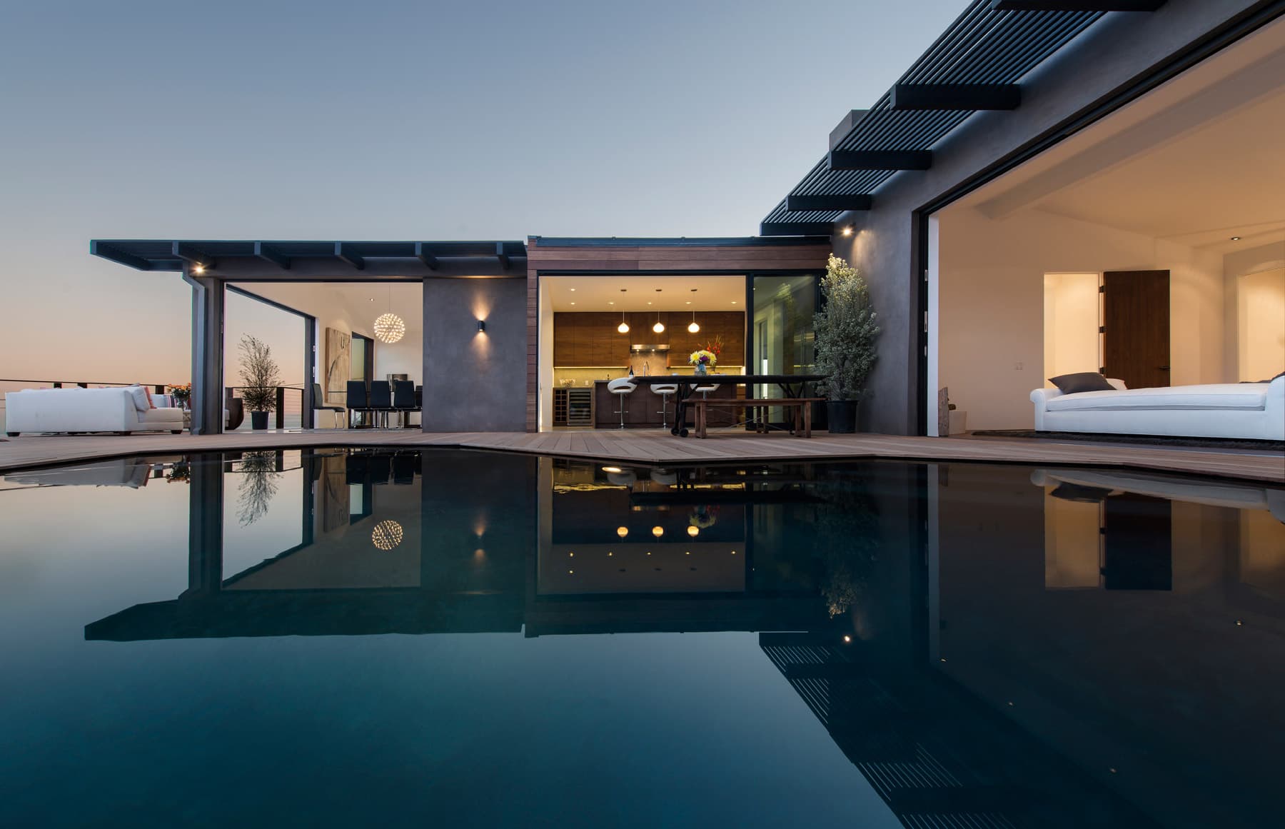 Modern hillside residence at twilight
