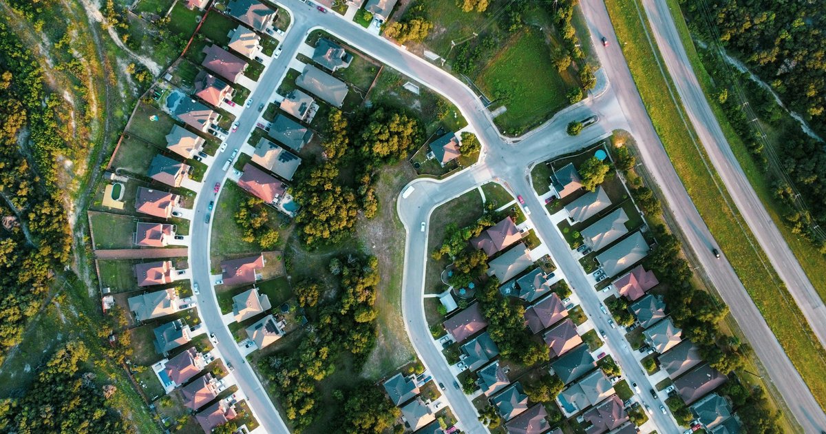 Aerial view of a Lake Lavon-area subdivision near Wylie, Texas, showing curved streets and newer construction